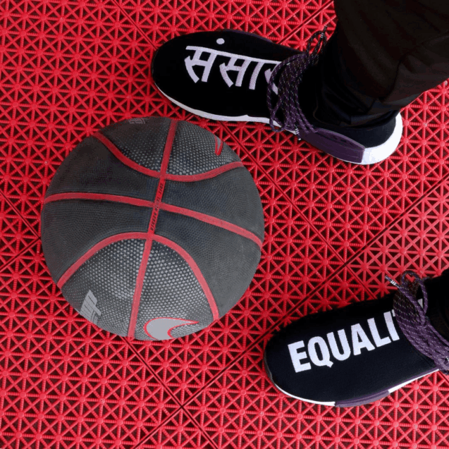 Basketball gear on textured court surface